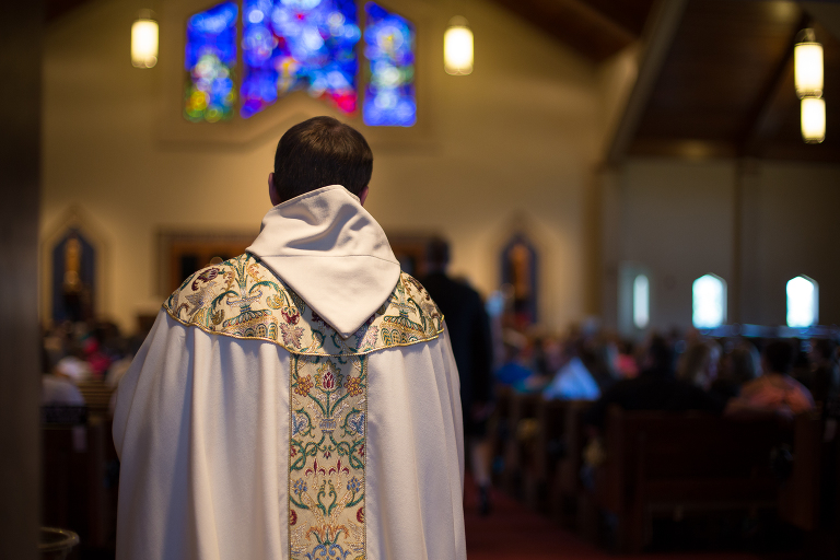 photo of priest at resurrection catholic church