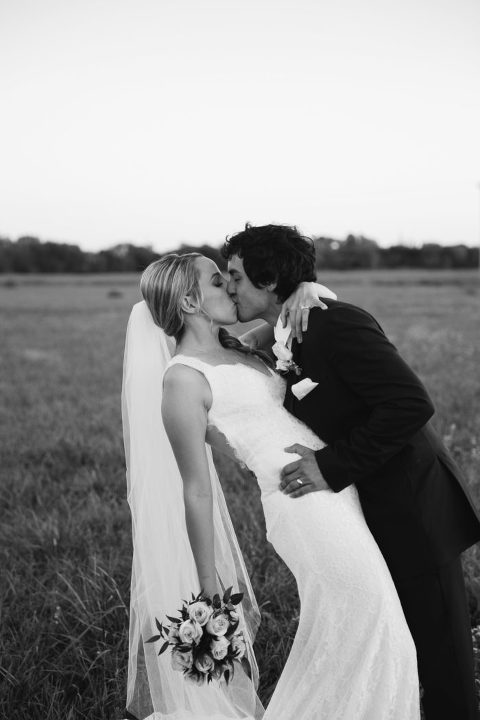 bride and groom kiss