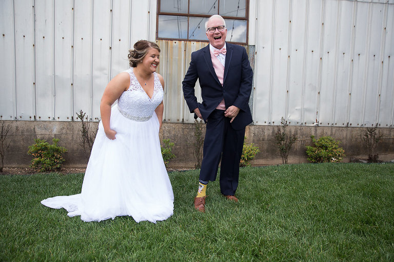bride and dad laughing