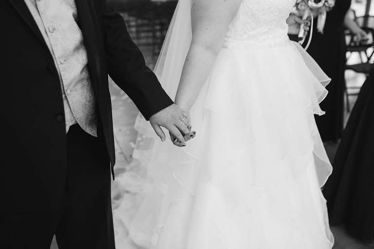 bride and groom holding hands wichita kansas