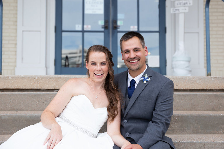 Bride and groom at Wichita boathouse